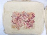 a bag with a floral design on it sitting on a table