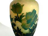 a vase that has a picture of a flower on it