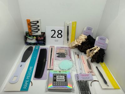 a table with a lot of items that include scissors, combs, scissors, and other items