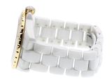 an image of a white watch with a gold band on a white surface