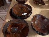 a table with a bunch of bowls and plates on it