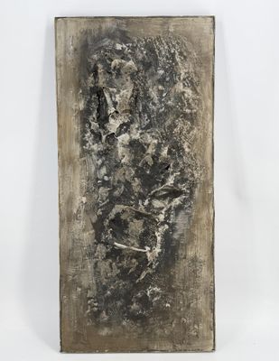 a black and white photo of a piece of art on a white surface