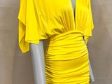a yellow dress on a mannequin mannequin mannequin mannequin mannequin mannequin mannequin mannequin mannequin