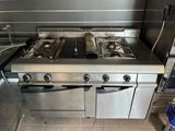 a stove with two burners and a grill top