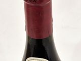 a bottle of wine that is sitting on a table