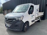 a picture of a white van parked in front of a building
