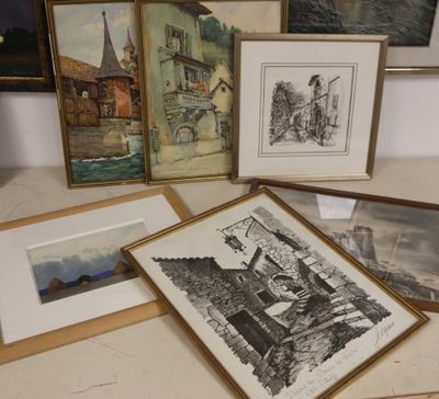several framed and unframed pictures of old buildings and buildings