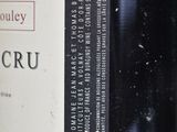 a label on a bottle of wine on a table