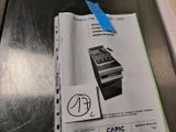 a picture of a paper with a picture of a machine on it