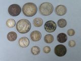 a lot of coins that are on the table