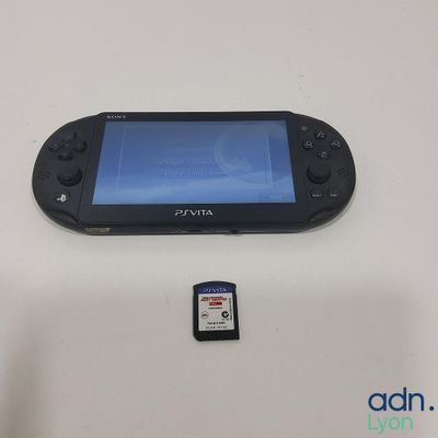 a game controller and a memory card next to it