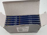 a box of blue batteries in it on a white surface