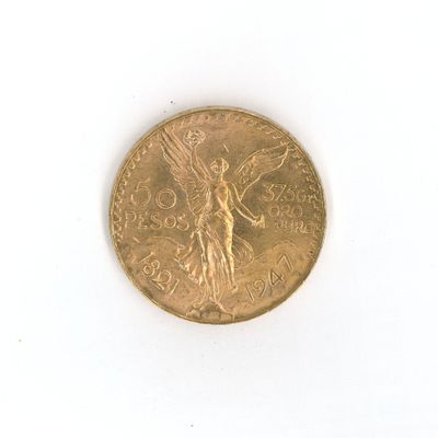 une pièce d'or avec l'image d'une femme dessus