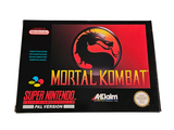 a box of the game mortal kombat on the table