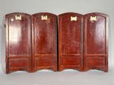 three wooden doors with brass hardware on each side of them