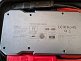 a close up of a battery in the back of a car
