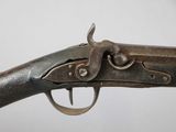 a close up of a gun on a white background