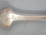 a spoon that is sitting on a table