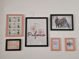 a picture of a wall with a bunch of pictures on it