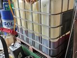 a metal container filled with water sitting on top of a table