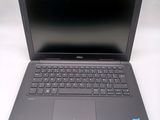 the dell laptop is open and ready to be used