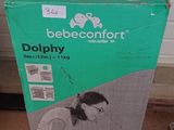 a box that has a baby in it on the floor