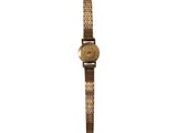 a close up of a wrist watch on a white background