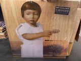 a cardboard box with a picture of a child on it