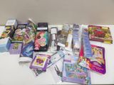 a lot of books and toys on the table