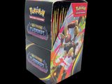 a box of pokemon trading cards on a black background