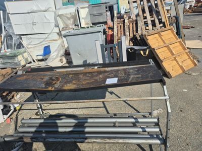a lot of junk on the ground in the parking lot