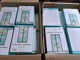 several boxes of electronic devices are stacked on top of each other