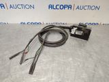 a picture of a picture of an electrical device with wires attached to it