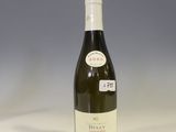 a bottle of wine that is sitting on a table