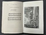 an open book with music notes in it on a table