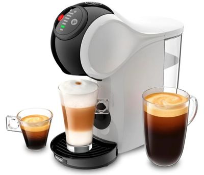 une image d'une machine à café avec une tasse de café à côté d'elle