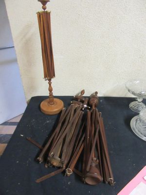 a table with a bunch of wooden spoons on it