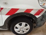 a white van with a red stripe on the side of it