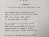an old black and white photo of a page of a book