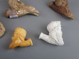 five different types of figurines displayed on a table