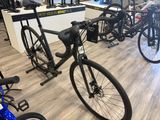 a bike that is parked in a bike shop