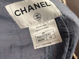 a chanel label on the back of a jacket