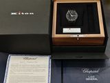 a box with a watch inside of it on a table