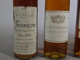 three bottles of wine sitting next to each other on a table