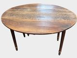 a round table with a wooden top on a white background