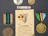 several medals and medals are arranged in a circle on a table