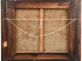 an old picture of a wooden frame with a rope hanging from it