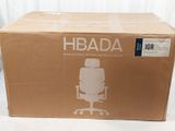 a cardboard box with a picture of an office chair on it