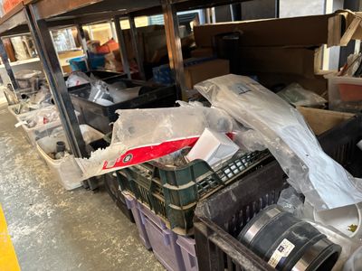 a pile of boxes that are sitting on the floor