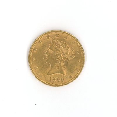 une pièce d'or ornée d'une tête de femme